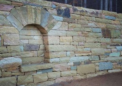 retaining wall with arched alcove