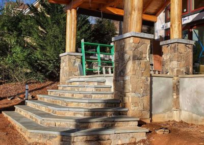 stone steps and stone pillar veneer